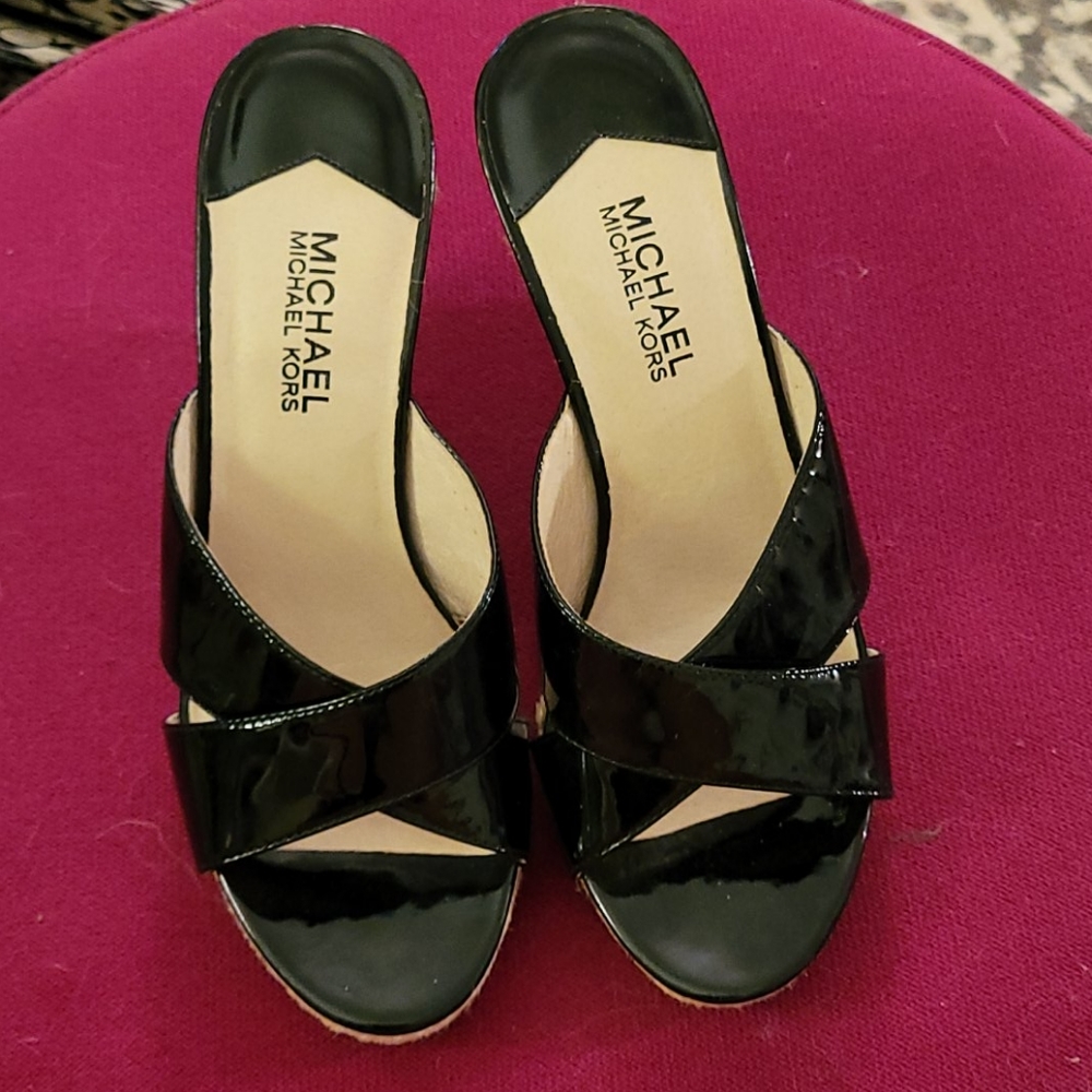 Michael Kors black patent leather wedges.